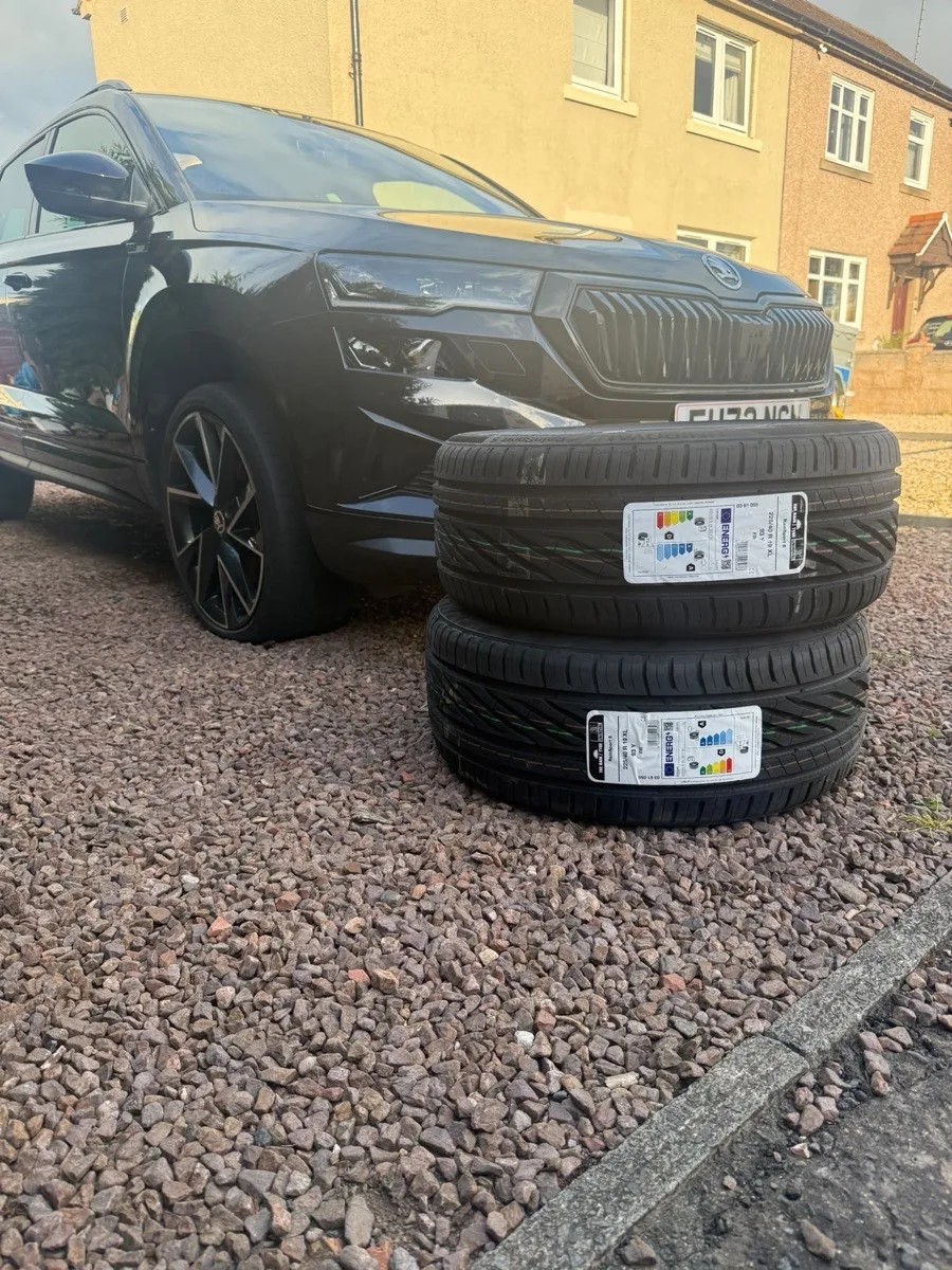 A vehicle raised for a tyre replacement