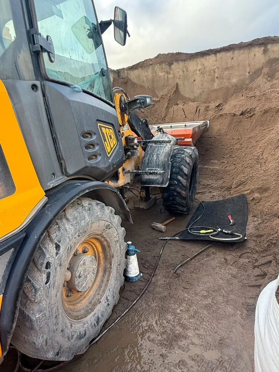 A vehicle raised for a new tyre replacement